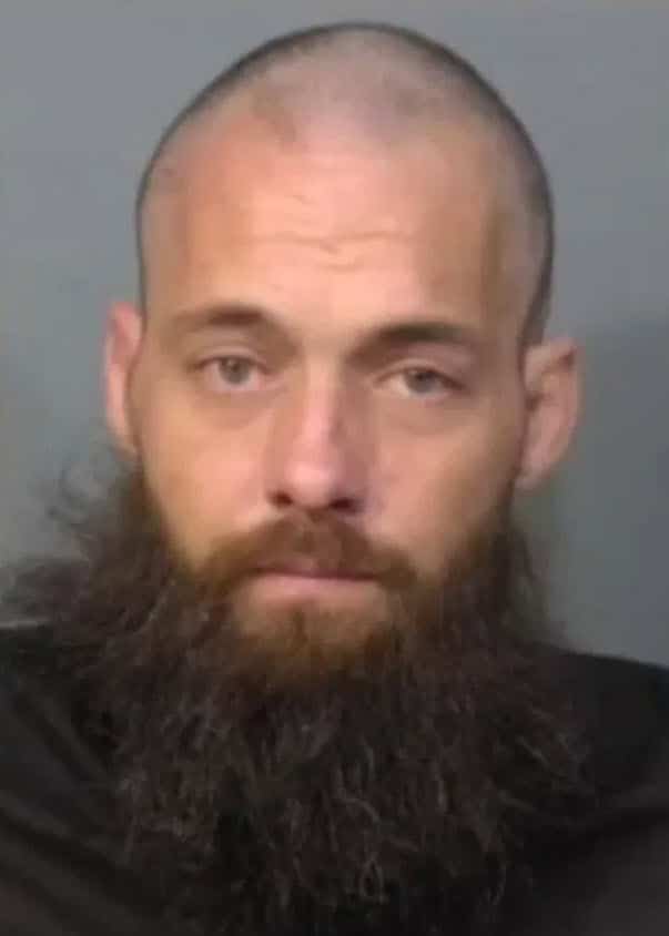 Monster Arrested For Slamming His Dog And Headbutting Police Car