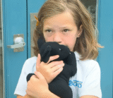 Child With Heart Condition Draws Courage from Black Lab Companion