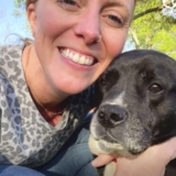 Trucker Finds Dog Trembling In A Pile of Tires And Immediately Calls For Help